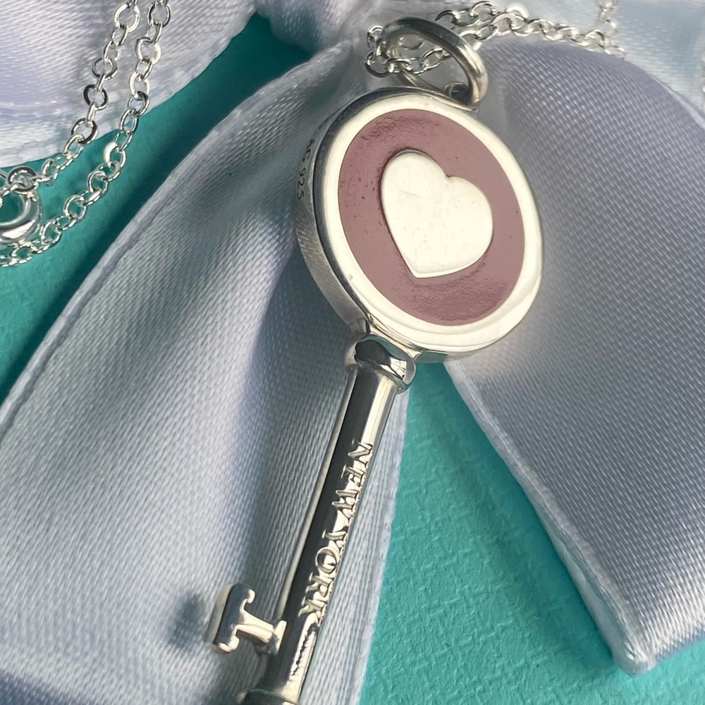 Tiffany & Co. New, Sterling Silver Red Heart Key Pendant. Authentic.